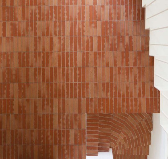 A stairway with genuine Italian terracotta tile